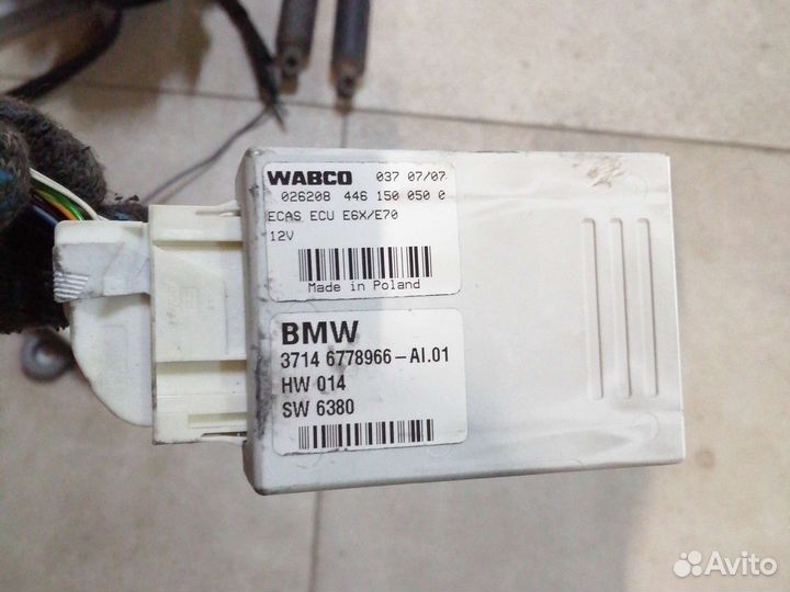 Блок управления пневмоподвески на BMW X5E70