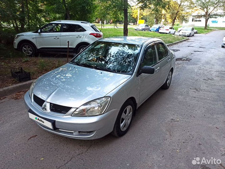 Mitsubishi Lancer 1.6 МТ, 2004, 198 000 км