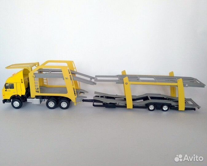Камаз-54115 автовоз (жёлтый) Cararama/New ray