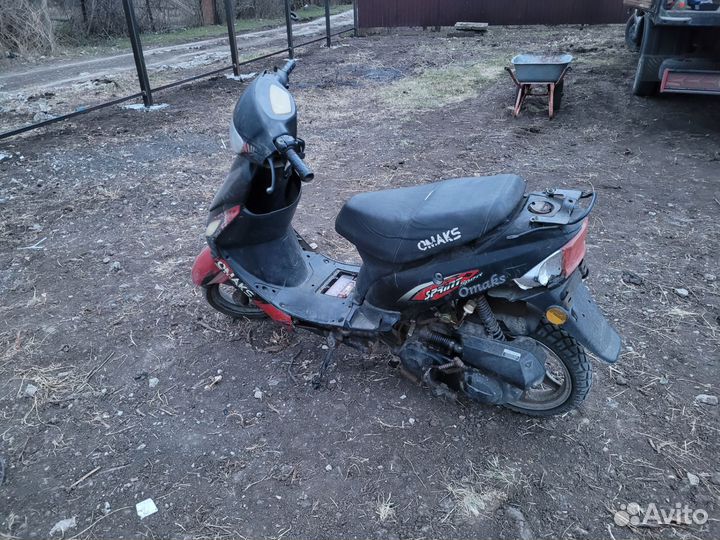 Скутер Omaks