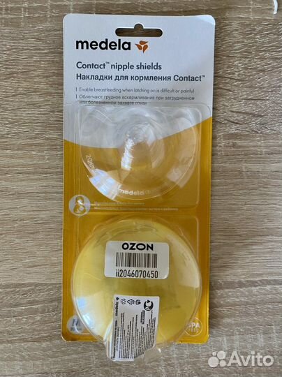 Молокоотсос электрический и накладки для кормления