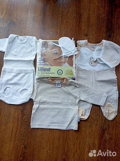 Одежда и пеленки для новорожденных