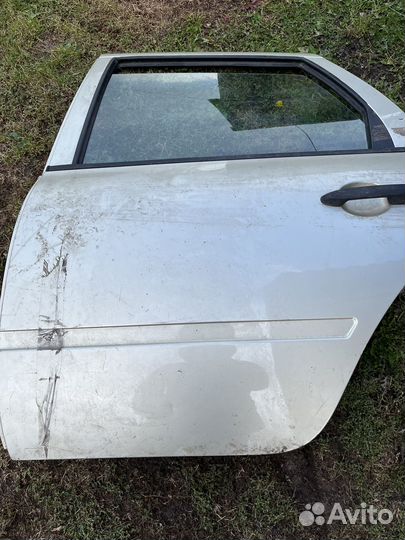 Двери на LADA калину