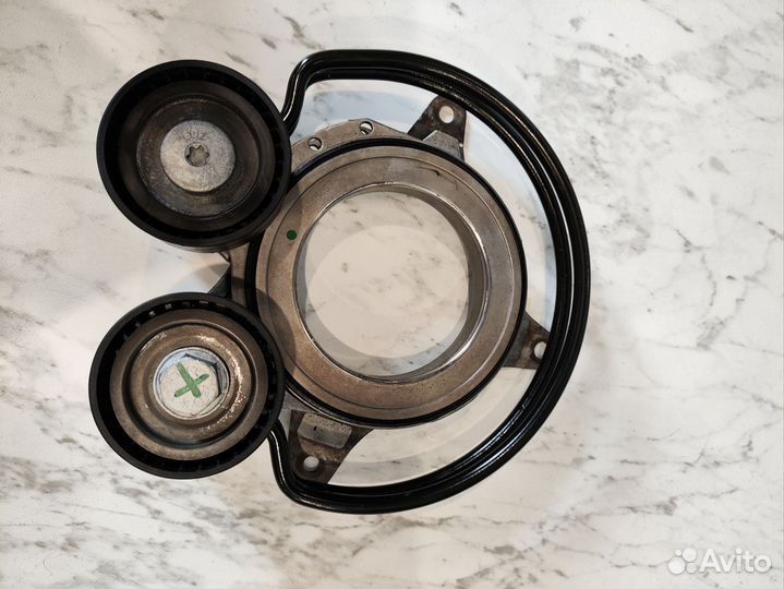 Натяжитель ремня 06N903133