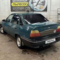 Daewoo Nexia 1.5 MT, 2003, 200 000 км, с пробегом, цена 115 000 руб.