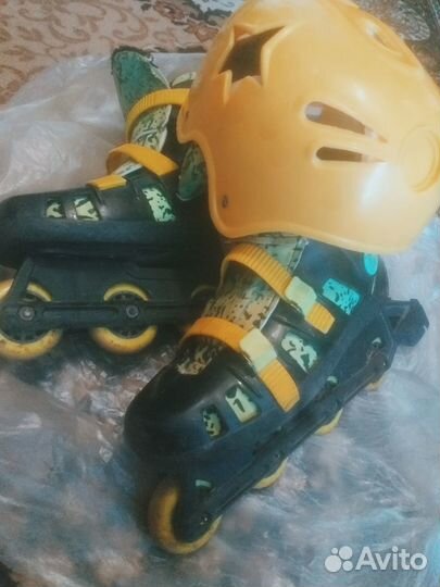 Роликовые коньки