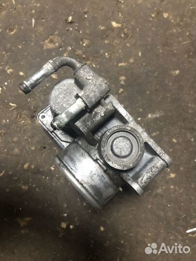 Дроссель Nissan Tiida 1