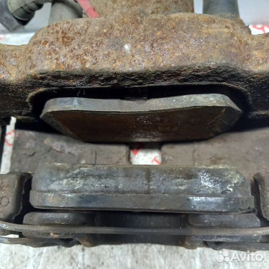 Суппорт тормозной передний левый Volkswagen Golf 5