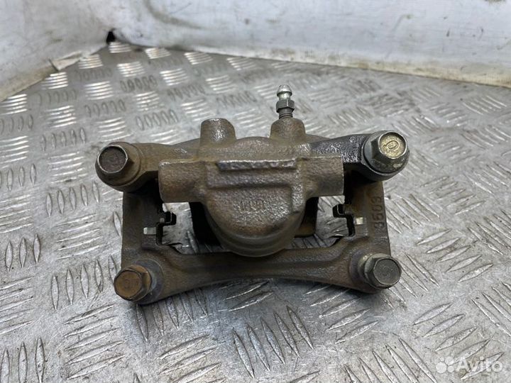 Суппорт тормозной задний левый Mitsubishi