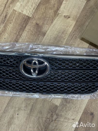 Решетка радиатора Toyota Corolla 120