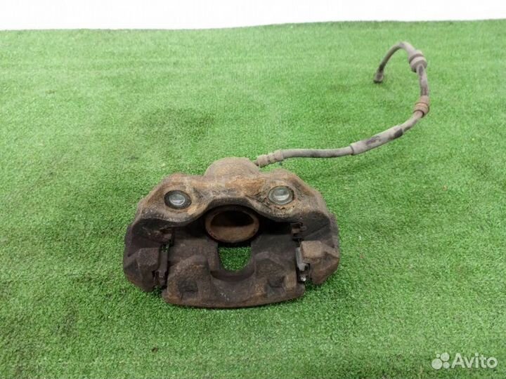 Суппорт тормозной передний правый Volkswagen Polo