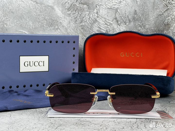 Солнцезащитные очки Gucci