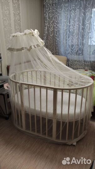 Детская кроватка трансформер с маятником