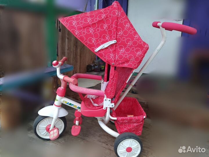 Трехколесный велосипед с ручкой