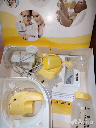 Молокоотсос medela электрический