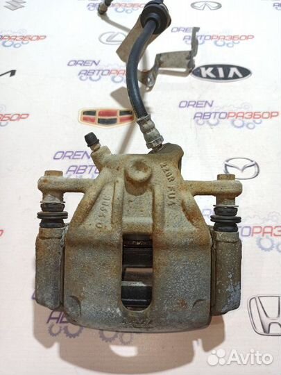 Суппорт тормозной передний правый Renault Duster