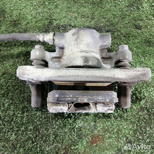 Суппорт тормозной задний правый Mitsubishi