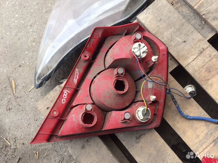 Фонарь левый chevrolet aveo T200