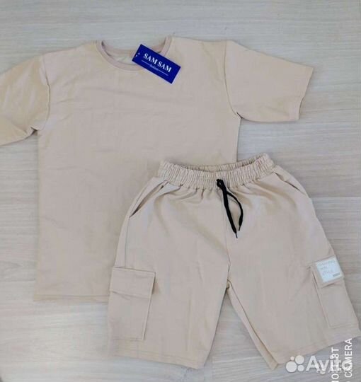 Костюм новый 48