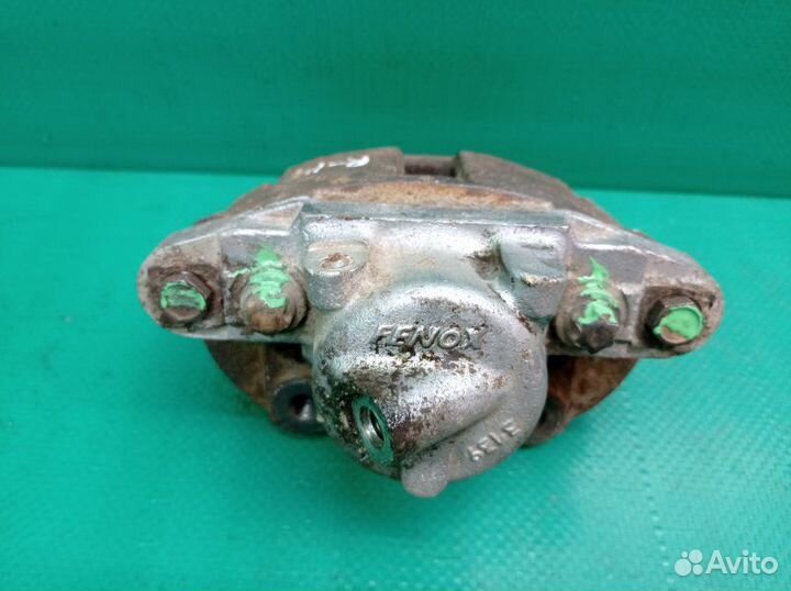 Суппорт тормозной передний левый Лада Калина 1