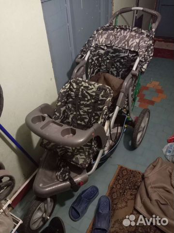 Двухместная коляска
