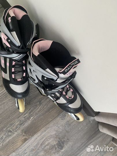 Роликовые коньки