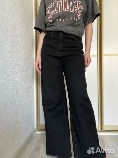 Джинсы широкие