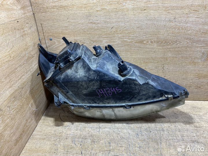 Фара передняя левая Ford Focus 1 дорест 141845