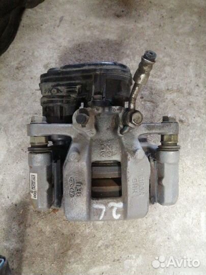 Суппорт задний левый Kia K8