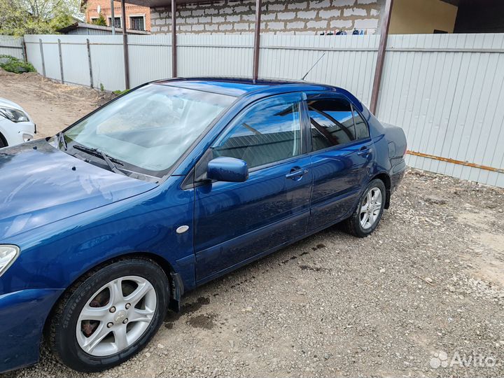 Mitsubishi Lancer 1.6 AT, 2006, 210 890 км