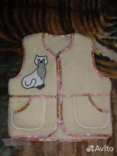 Кофточки, жилетки, ползунки и плед из овчины