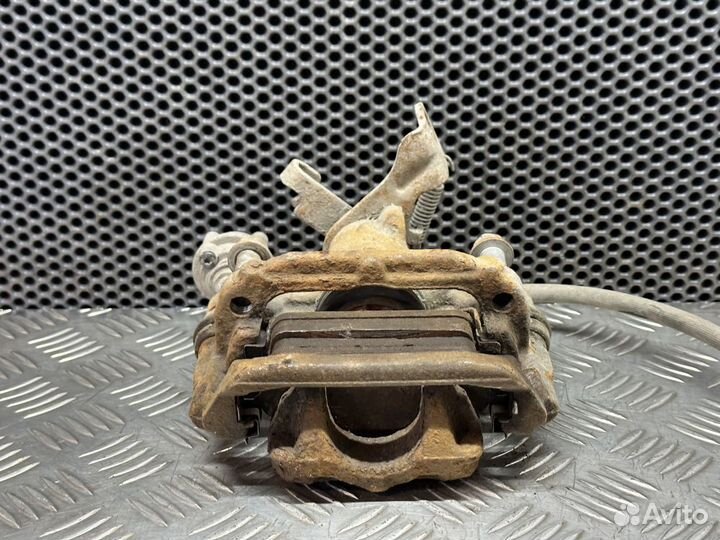 Суппорт задний левый Chevrolet Cruze J300