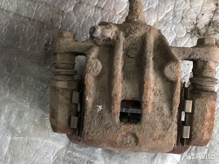 Суппорт тормозной задний Hyundai Sonata 5 EF тагаз