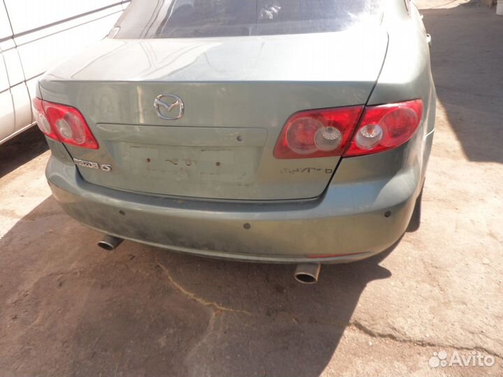 Полуось левая передняя Мазда 6