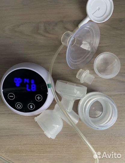 Электрический молокоотсос