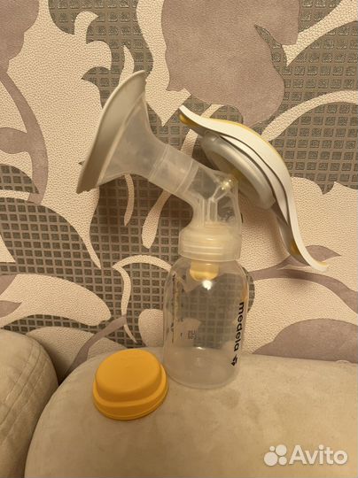 Молокоотсос medela ручной