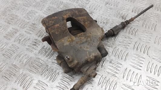 Суппорт тормозной передний левый skoda octavia A5