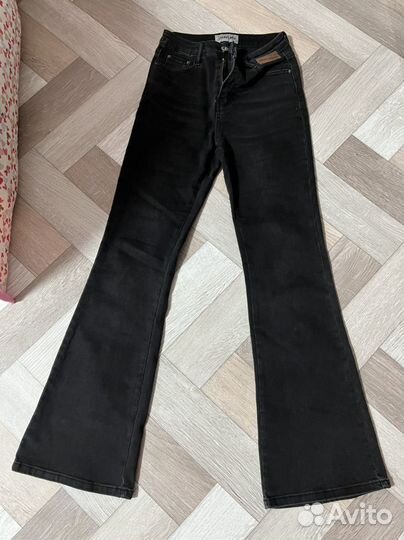 Джинсы клеш женские