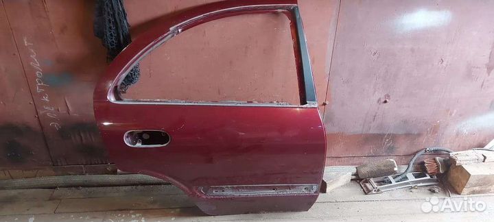 Дверь Nissan almera n16