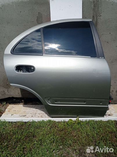 Двери задние Nissan Almera