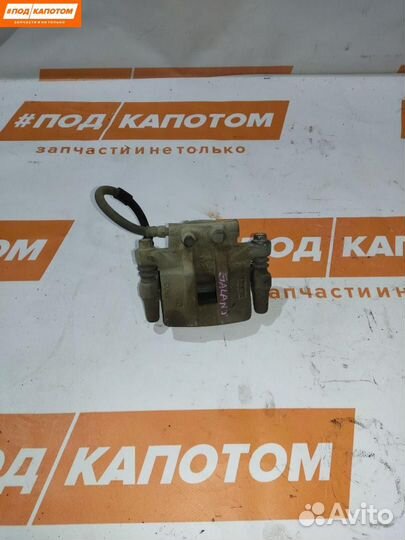 Суппорт тормозной задний левый Mitsubishi Lancer