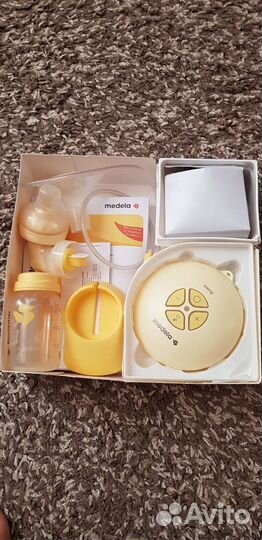 Молокоотсос medela swing электрический