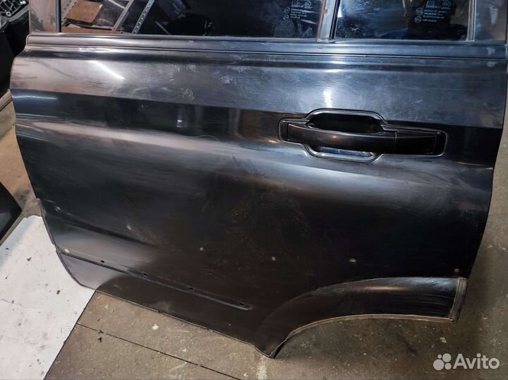 Дверь задняя левая Ссанг Йонг Кайрон