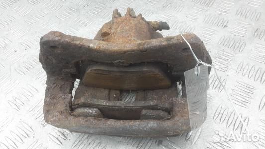 Суппорт тормозной передний правый mitsubishi caris