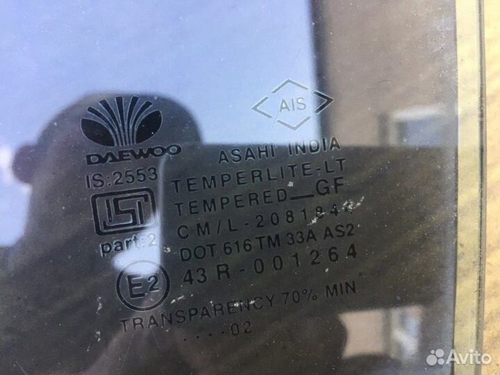 Стекло двери заднее левое Daewoo Nexia sedan 1.5