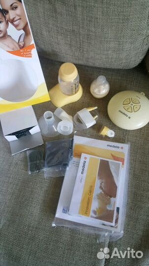 Молокоотсос Medela Swing + смартсoска Calma