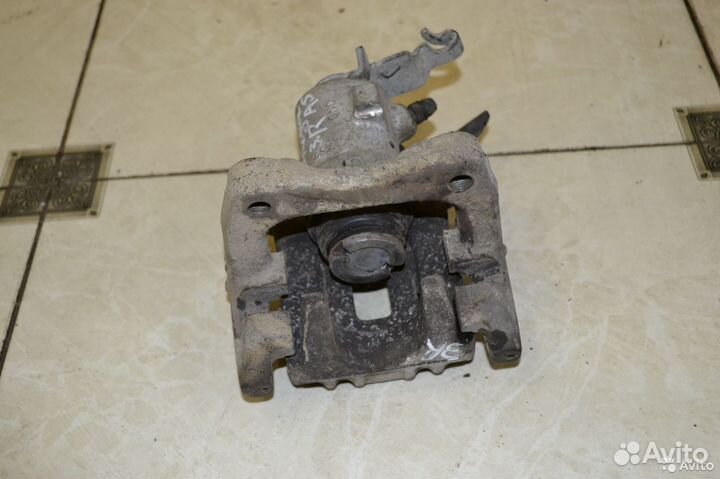 Тормозной суппорт задний правый Skoda Octavia А5