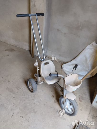 Трехколесный велосипед с ручкой