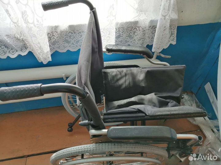 Инвалидное кресло
