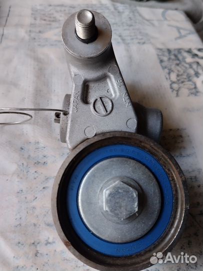 Натяжной ролик на Субару